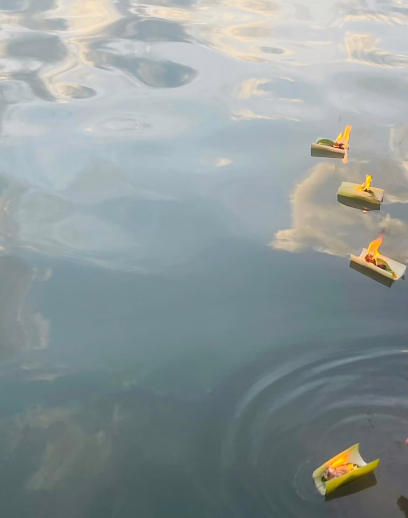 Lit diyas glowing in the evening, symbolizing peace and spiritual energy